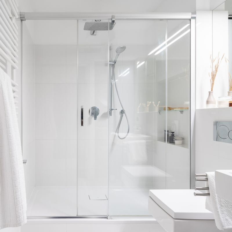 Minimalist Shower with Glass Enclosure